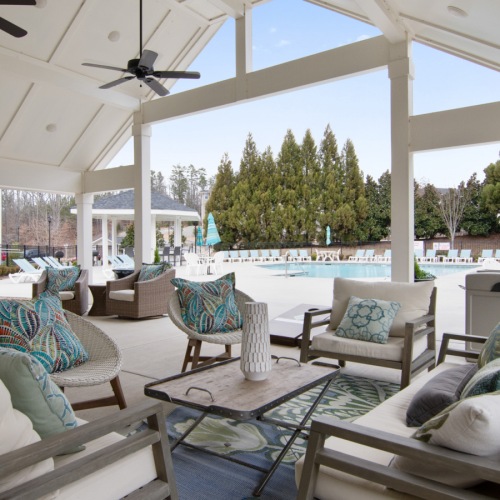 outdoor lounge next to pool 