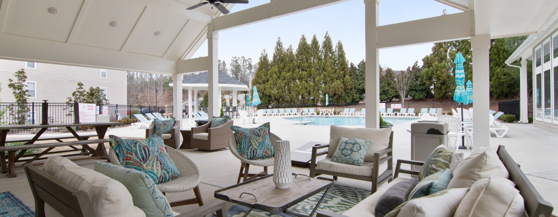 outdoor lounge next to pool 