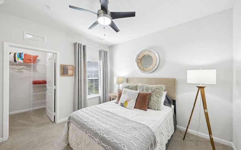 secondary bedroom with walk in closet